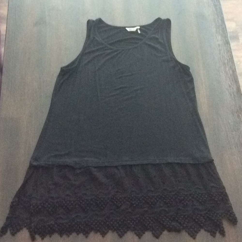 Super cute long tank top with lace at bottom